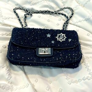 Starry night, Karl Lagerfield bag. In great condition zippers work. Clasp works.